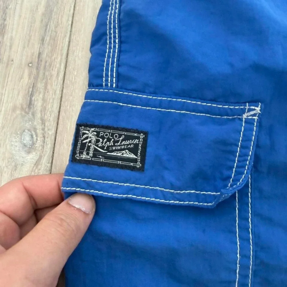 Y2K 2000s Ralph Lauren blue swim shorts with plaid lining. Size L